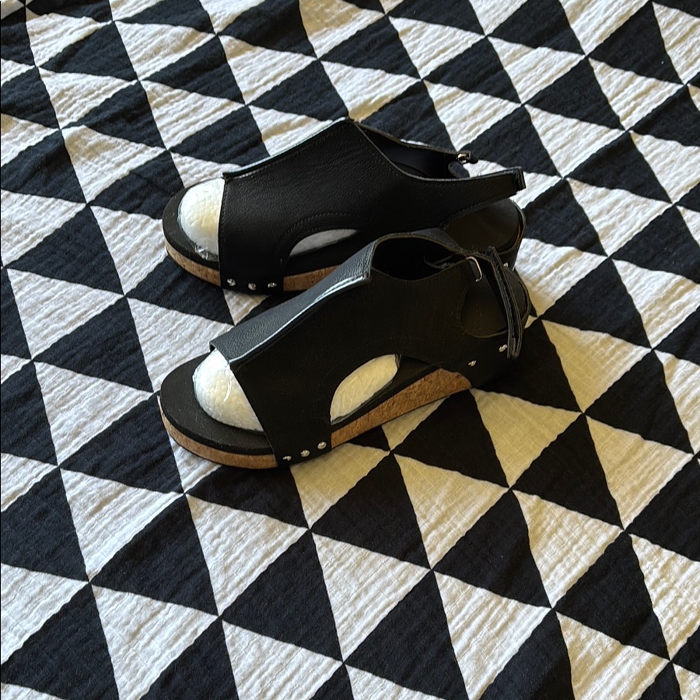 Black faux leather heeled sandals